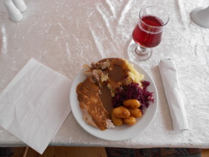 my thanksgiving dinner complete with red saft, brun kartofler - it's Little baby potatoes cooked, like fried I guess, in some kind of liquid something - knowing danes, probably cream - and Brown sugar. actually reallllllly yummy! - something that was trying to be like stuffing. trying really hard. mashed potatoes - made by søster Ivie - one of the ægtepar here. and rød kød. it's....red cabbage? yup. definitely a Danish thanksgiving! oh! and we had this lemon cream stuff for dessert. danes and their cream :) 
